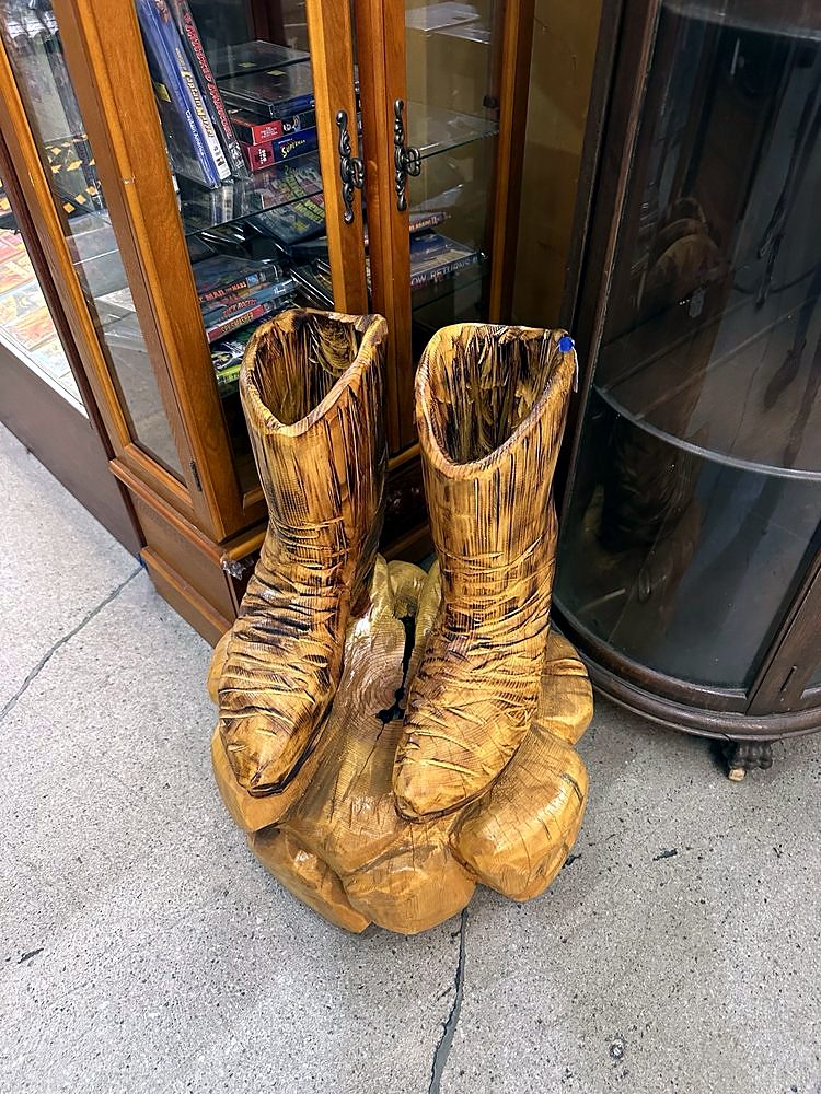 Carved wooden boots