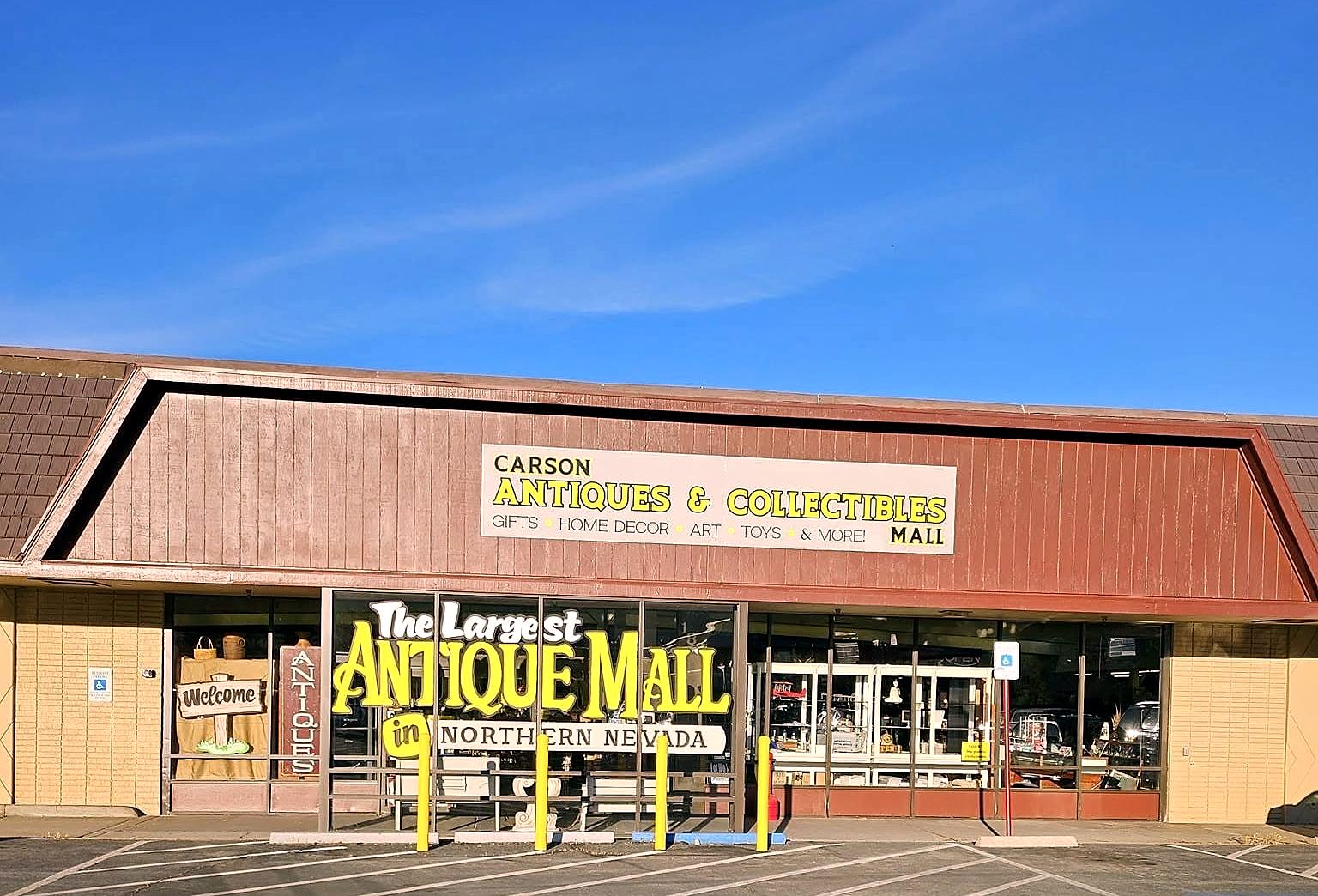 Carson Antiques & Collectibles Mall storefront on North Carson Street — yellow sign, front parking lot
